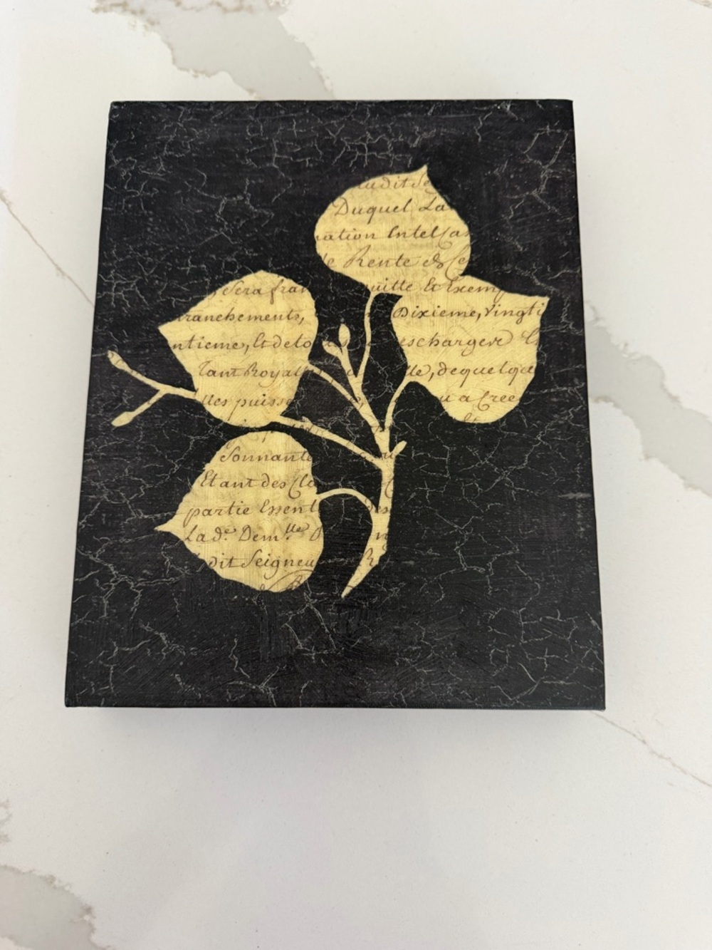 Decoupage II canvas art with Beige Leaf Silhouette on textured background